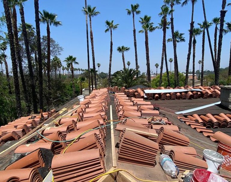 Slide of Elite Roofing and Solar Solutions