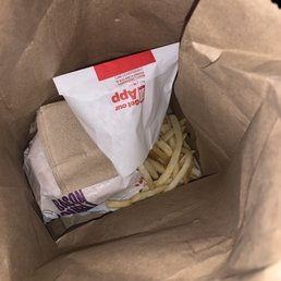 french fries in a brown paper bag french fries in a brown paper bag