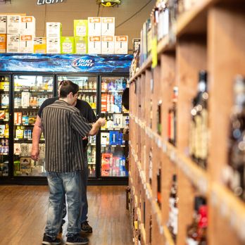 Flathead Liquor - a man in a liquor store - Casinos Near Me - Kalispell, Montana Flathead Liquor - a man in a liquor store - Casinos Near Me - Kalispell, Montana