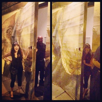The Violet Hour - Photo op with the secret door,  photo bombed by the bouncer/greeter - New American Near Me - Chicago, Illinois