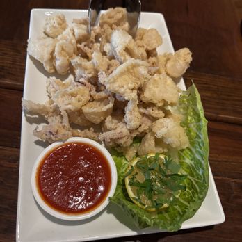 Poor Italian - FRIED CALAMARI - 32 Lightly Floured Deep Fried Calamari, Fresh Lemon, Herbs and Marinara Dipping Sauce - Italian Near Me - Vancouver, British Columbia Poor Italian - FRIED CALAMARI - 32 Lightly Floured Deep Fried Calamari, Fresh Lemon, Herbs and Marinara Dipping Sauce - Italian Near Me - Vancouver, British Columbia