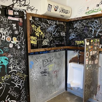 12 Bones Smokehouse RIVER - Yup! That's the men's bathroom, where the graffiti vibe is strong. I guess graffiti can be macho - Barbeque Near Me - Asheville, North Carolina