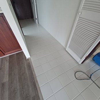 The Grout Doctor - Honolulu - The interior tiles had very dark grout lines that made it look worn and old, after 5 hrs it looked as if the entire house had been retiled! - Tiling Near Me The Grout Doctor - Honolulu - The interior tiles had very dark grout lines that made it look worn and old, after 5 hrs it looked as if the entire house had been retiled! - Tiling Near Me