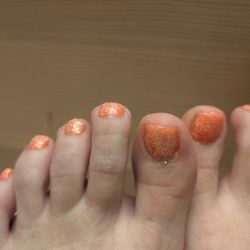 Anthony Vince Nail Spa - The glitter had some odd reaction. Repainted top after I noticed they were still wet after 30min. SO gooey and cheap!