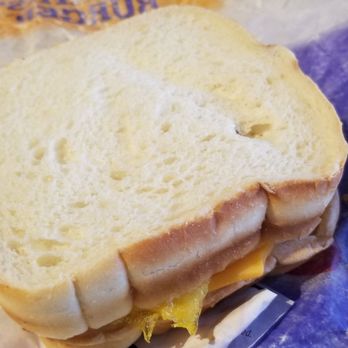 Carl's Jr - Ordered Sausage Grilled Cheese Breakfast Sandwich, this is what I got, cold bread and cheese not melted... told it's made this way. - Fast Food Near Me - Firestone, Colorado