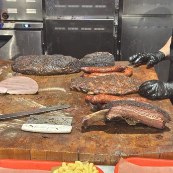 Terry Black's Barbecue - This is where your meat is cut based on your choice and amount - Barbeque Near Me - Austin, Texas Terry Black's Barbecue - This is where your meat is cut based on your choice and amount - Barbeque Near Me - Austin, Texas
