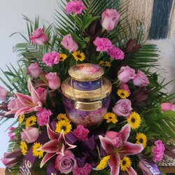 Pathelen Flower & Gift Shop - The arrangement for my mom's urn. It has 50 flowers and a touch of gold in it to signify the 50 years she and my step-dad were married.