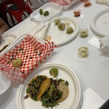 Los Tacos Lokos - We were too hungry from waiting too long to take a pic of everything that we had ordered. - Tacos Near Me - Riverside, California