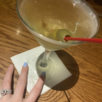 Hickory Street Lounge - a woman's hand holding a martini glass - Lounges Near Me - Denton, Texas Hickory Street Lounge - a woman's hand holding a martini glass - Lounges Near Me - Denton, Texas