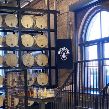 Michter's Distillery - barrels stacked on shelves - Distilleries Near Me
