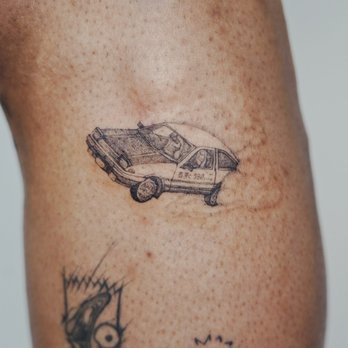 Mateo Studio LA - Initial D car with some clouds - Tattoo Near Me - Los Angeles, California Mateo Studio LA - Initial D car with some clouds - Tattoo Near Me - Los Angeles, California