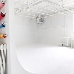 Sandbox Studios - We have backdrops and chairs available during your cyclorama rental.
