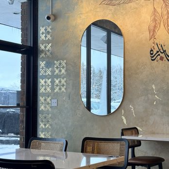 Shibam Coffee - Wall art with mirrors to make the space feel even more open - Desserts Near Me - North Olmsted, Ohio Shibam Coffee - Wall art with mirrors to make the space feel even more open - Desserts Near Me - North Olmsted, Ohio
