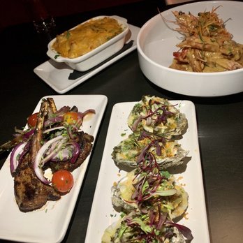 Continent Restaurant & Cigar Lounge - Spiced Lamb Chops, Four Cheese Mac, Yard Man Oysters, Pepper Prawns - Cigar Bars Near Me - Atlanta, Georgia