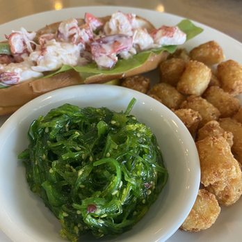Cod & Capers Seafood - Lobster Roll with seaweed salad and tater tots as sides! - Seafood Near Me - North Palm Beach, Florida Cod & Capers Seafood - Lobster Roll with seaweed salad and tater tots as sides! - Seafood Near Me - North Palm Beach, Florida