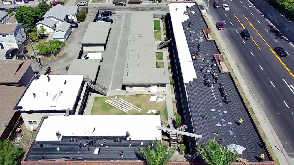 Slide of Queen Roofing