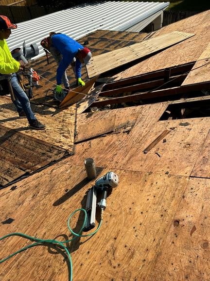 Slide of Big Fish Roofs & Restoration