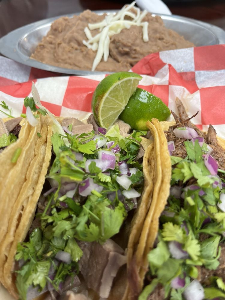 Taqueria el Comal Logo