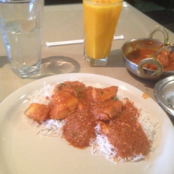 Curry Kitchen - Chicken Vindaloo, basmati rice, and a Mango Lassi .  The drink was only fair- but the chicken was good. - Indian Near Me - Muskegon, Michigan