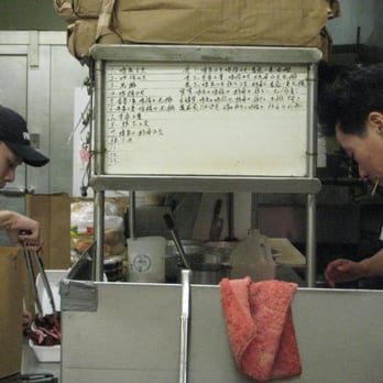 Happy Garden - two men preparing food in a kitchen - Chinese Near Me - Plymouth, Massachusetts Happy Garden - two men preparing food in a kitchen - Chinese Near Me - Plymouth, Massachusetts