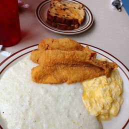 Catfish and grits with eggs scrambled soft and raisin toast Catfish and grits with eggs scrambled soft and raisin toast