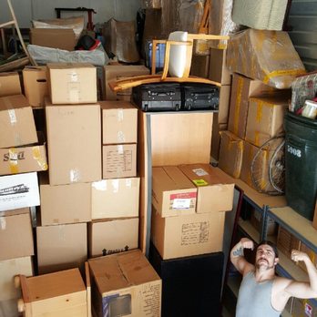 Your Personal Mover - Unloading a storage unit stacked high - Movers Near Me - Golden, Colorado