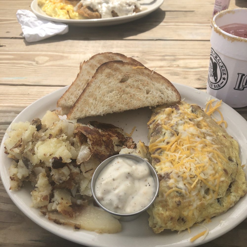 Florida Cracker Kitchen - Riverside Resort - Bacon, sausage and veggies omelette. Breakfast potatoes and toast with sausage gravy. - Breakfast & Brunch Near Me - Homosassa, Florida Florida Cracker Kitchen - Riverside Resort - Bacon, sausage and veggies omelette. Breakfast potatoes and toast with sausage gravy. - Breakfast & Brunch Near Me - Homosassa, Florida