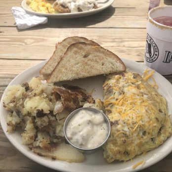 Florida Cracker Kitchen - Riverside Resort - Bacon, sausage and veggies omelette. Breakfast potatoes and toast with sausage gravy. - Breakfast & Brunch Near Me - Homosassa, Florida Florida Cracker Kitchen - Riverside Resort - Bacon, sausage and veggies omelette. Breakfast potatoes and toast with sausage gravy. - Breakfast & Brunch Near Me - Homosassa, Florida