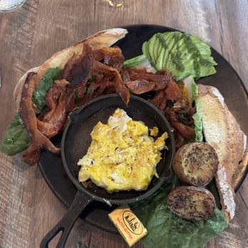 Sunny Eggs - Palm Breakfast (eggs, potatoes, toast, bacon, avocado, and roasted tomato's) - Juice Bars & Smoothies Near Me - Key West, Florida Sunny Eggs - Palm Breakfast (eggs, potatoes, toast, bacon, avocado, and roasted tomato's) - Juice Bars & Smoothies Near Me - Key West, Florida