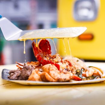 Bachi Bus - a plate of food being eaten - Teppanyaki Near Me - Los Angeles, California Bachi Bus - a plate of food being eaten - Teppanyaki Near Me - Los Angeles, California