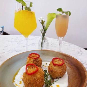 Limoncello - Arancini, peach Bellini, mango tropical sangria - Italian Near Me - La Mesa, California Limoncello - Arancini, peach Bellini, mango tropical sangria - Italian Near Me - La Mesa, California