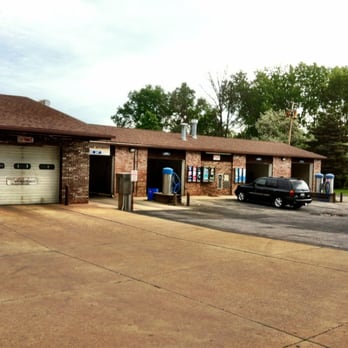 The Junction - a parking lot with a car parked in front of it - Beer, Wine & Spirits Near Me - Amherst, Ohio