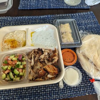 Zankou Chicken - Chicken Tarna plate, w/ tzatziki, hummus, garlic sauce, chili sauce, baklava and pita. - Mediterranean Near Me - Long Beach, California Zankou Chicken - Chicken Tarna plate, w/ tzatziki, hummus, garlic sauce, chili sauce, baklava and pita. - Mediterranean Near Me - Long Beach, California