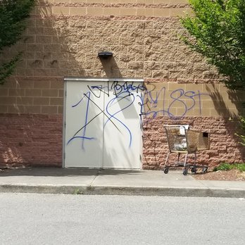 Safeway - a white door with graffiti on it - Grocery Near Me - Covington, Washington Safeway - a white door with graffiti on it - Grocery Near Me - Covington, Washington