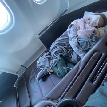 Hawaiian Airlines - Photo of my daughter sleeping in the lie flat seat - Airlines Near Me - San Diego, California Hawaiian Airlines - Photo of my daughter sleeping in the lie flat seat - Airlines Near Me - San Diego, California