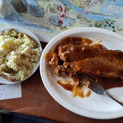 Mr. Baldy's Family Restaurant - A slice of meatloaf as big as the plate! And a delicious baked potato.