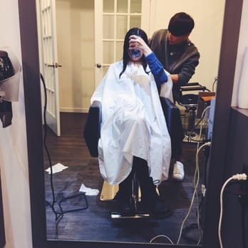 DV Hair Studio - while he is cutting my hair. - Hair Salons Near Me - Flushing, New York