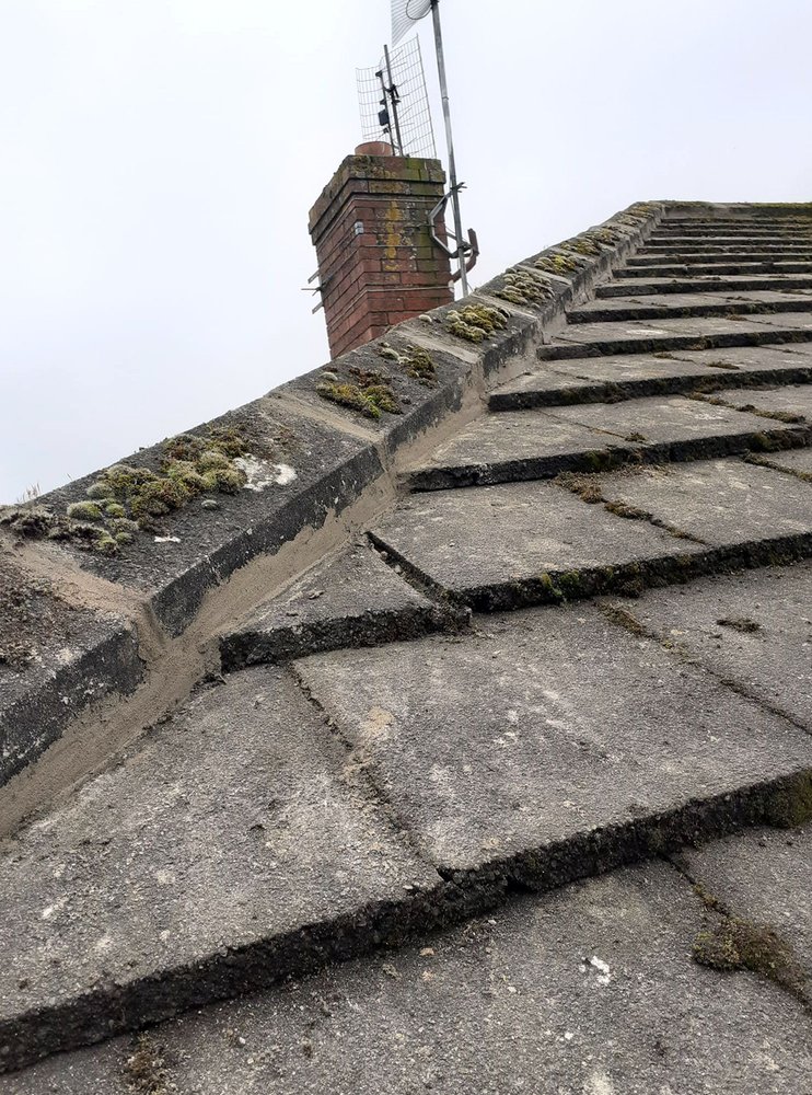 Slide of Pecan Park Roofing