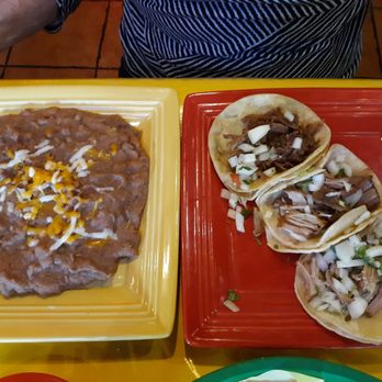 Los Dos Amigos - Carnitas tacos with a side of beans - Mexican Near Me - Thousand Oaks, California Los Dos Amigos - Carnitas tacos with a side of beans - Mexican Near Me - Thousand Oaks, California