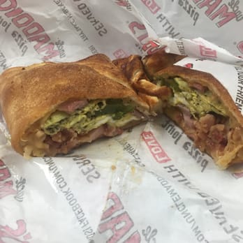Uncle Maddio's Pizza Joint - The Country Boy breakfast calzone - Pizza Near Me - Charlotte, North Carolina Uncle Maddio's Pizza Joint - The Country Boy breakfast calzone - Pizza Near Me - Charlotte, North Carolina