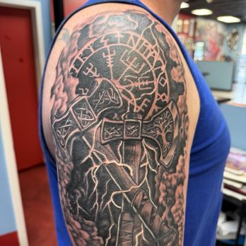 Rose & Dagger Tattoo - My Norse mythology 1/2 sleeve by Tim, featuring Mjolnir, Jarnbjorn, and the Norse compass. - Tattoo Near Me - Houston, Texas Rose & Dagger Tattoo - My Norse mythology 1/2 sleeve by Tim, featuring Mjolnir, Jarnbjorn, and the Norse compass. - Tattoo Near Me - Houston, Texas