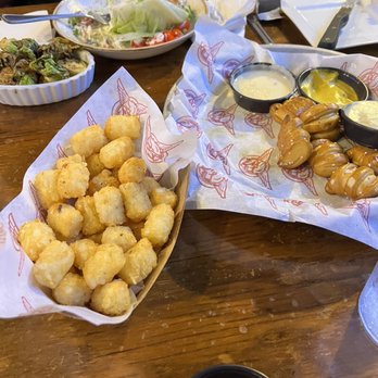 Taco Mac - Bavarian Pretzel Bites, Tots, Crispy Brussels Sprouts, Wedge salad (sorry we were eating when I remembered pictures) - American Near Me - Douglasville, Georgia