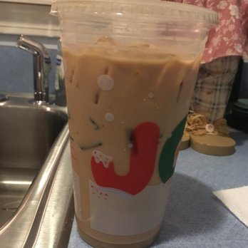 Dunkin' -  a cup of iced coffee on a kitchen counter - Donuts Near Me - Thomaston, Connecticut