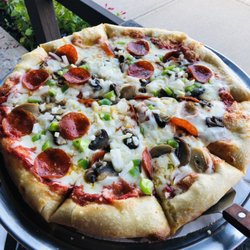 Pizza Plus & Longhorn Saloon with the Game Room - An excellent pie with fresh toppings.