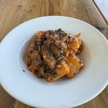 IL  Posto - paccheri pasta in creamy vodka sauce with mushrooms and sausage - Italian Near Me - San Diego, California