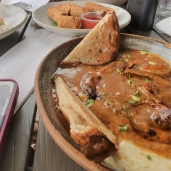 Bearcat Cafe - Shrimp and grits and boudin egg rolls - Breakfast & Brunch Near Me - New Orleans, Louisiana Bearcat Cafe - Shrimp and grits and boudin egg rolls - Breakfast & Brunch Near Me - New Orleans, Louisiana