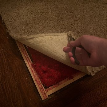 Abeln Floor Systems - Old gross carpet in the two bedrooms (cut into middle of room - apparently fashionable at some point) - Flooring Near Me - Maplewood, Missouri