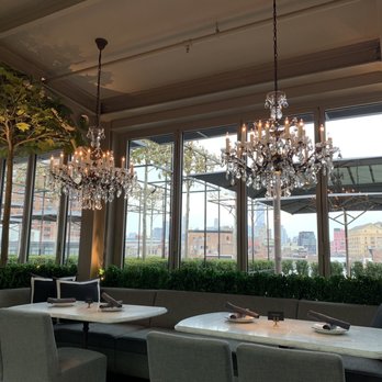 RH New York | The Gallery in the Historic Meatpacking District - Seating options with a view of the outdoor area - Home Decor Near Me - New York, New York RH New York | The Gallery in the Historic Meatpacking District - Seating options with a view of the outdoor area - Home Decor Near Me - New York, New York
