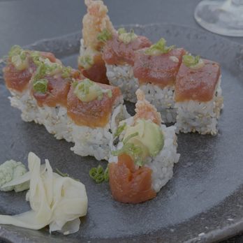 Next Door by Wegmans - Red dragon sushi roll with tempura shrimp, cream cheese, avocado, spicy tuna, and sweet miso - Sushi Bars Near Me - Rochester, New York Next Door by Wegmans - Red dragon sushi roll with tempura shrimp, cream cheese, avocado, spicy tuna, and sweet miso - Sushi Bars Near Me - Rochester, New York