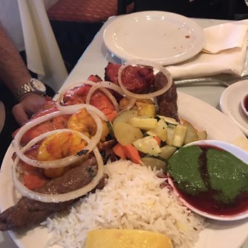 Saffron Grill - Tandoori Suprise: beef kebab, chicken tandoori, cod tandoori, prawn tandoori, and lamb. - Indian Near Me - Seattle, Washington Saffron Grill - Tandoori Suprise: beef kebab, chicken tandoori, cod tandoori, prawn tandoori, and lamb. - Indian Near Me - Seattle, Washington